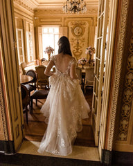 Elegant Long A-line V-neck Wedding Dress with Cap Sleeves and Lace Details