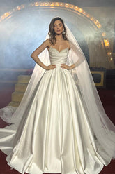 Graceful Floor-Length Sleeveless Satin Wedding Dress with Subtle Bead Details
