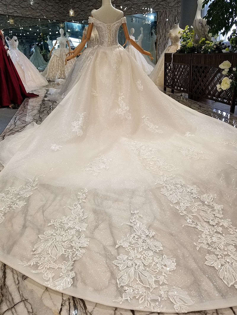 Elegant Off-the-shoulder White A-line Wedding Dresses Tulle Ruffles Bridal Gowns With Appliques Online